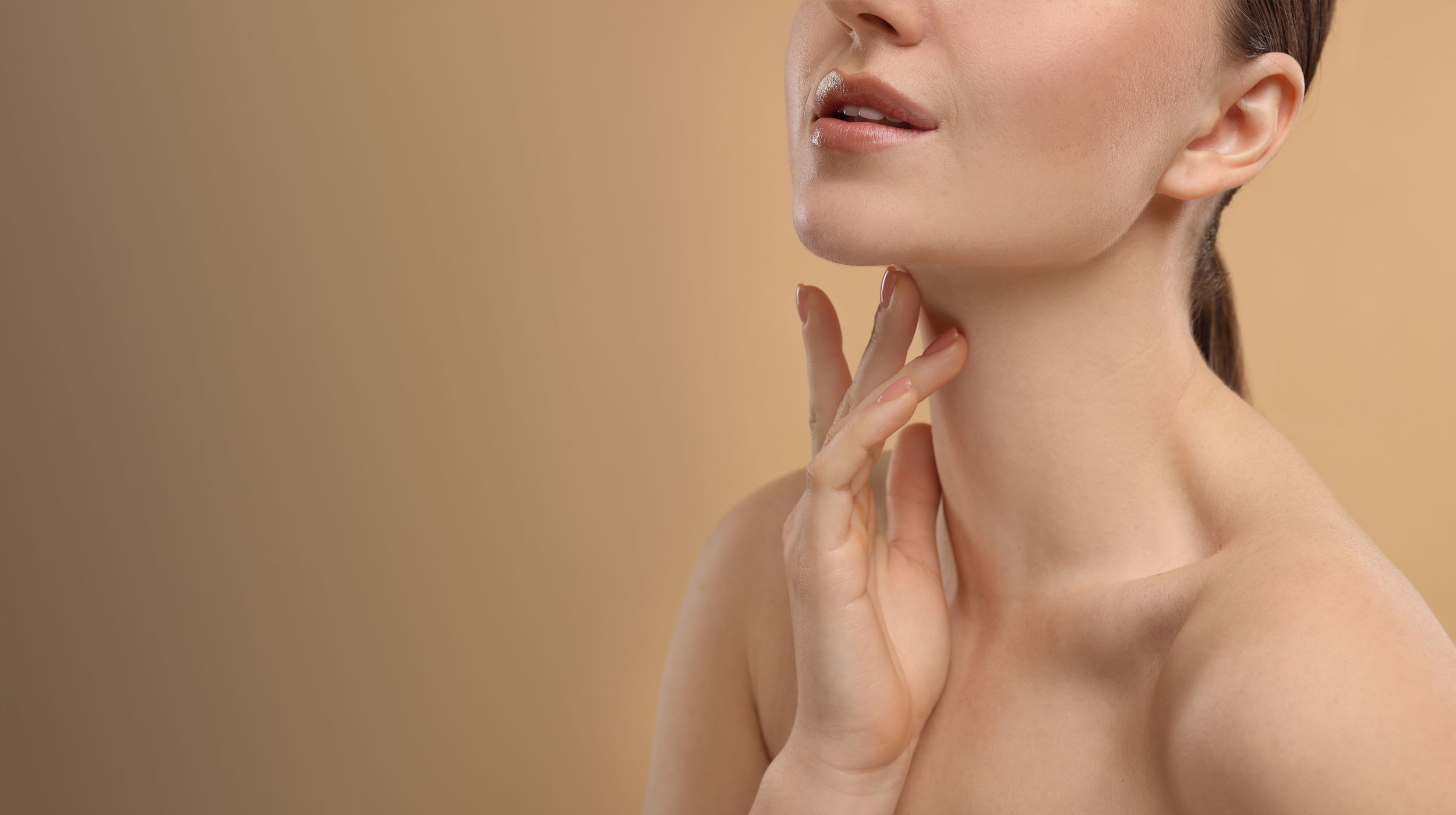 Close-up of woman's neck